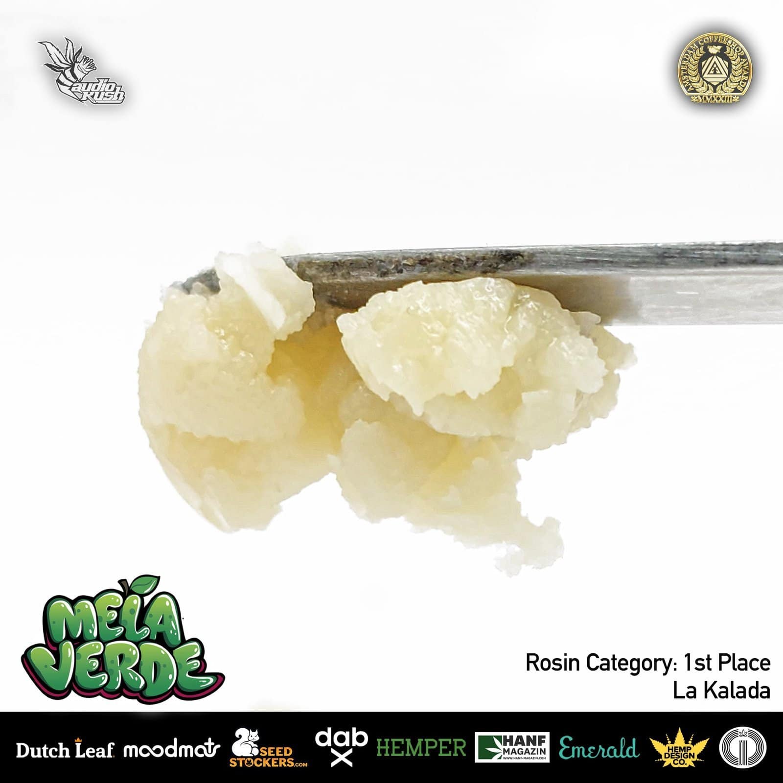 A close-up of creamy white cannabis rosin on a metal dab tool over a white background, highlighting its smooth, melted texture, perfect for concentrate enthusiasts and medical cannabis users.