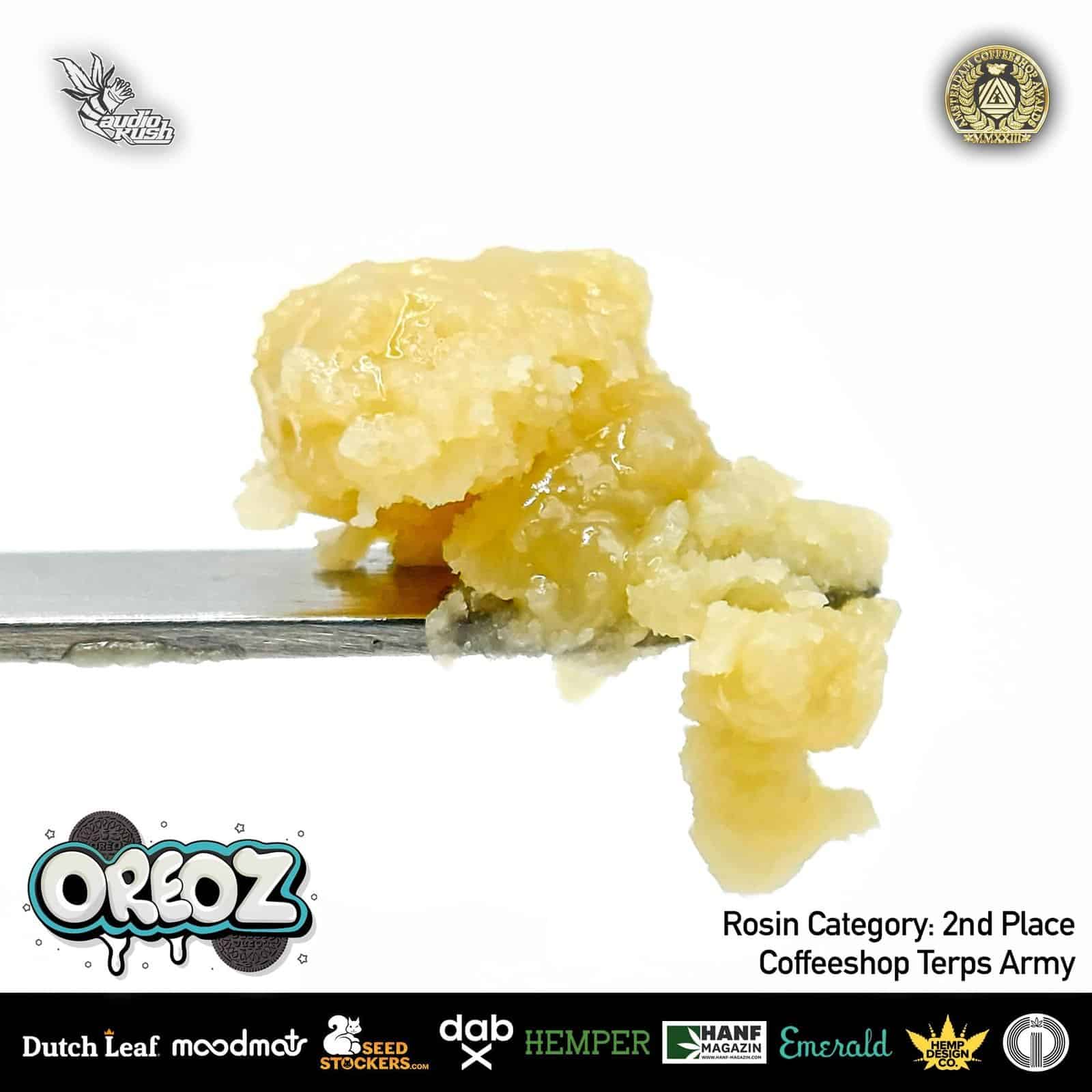 Crispy cannabis-infused cheese crumb on fork, high-quality close-up of cheese crumble for edible products and medicinal cannabis edibles, premium cannabis food ingredient, curly cannabis crumb, second place rosin cannabis concentrate.