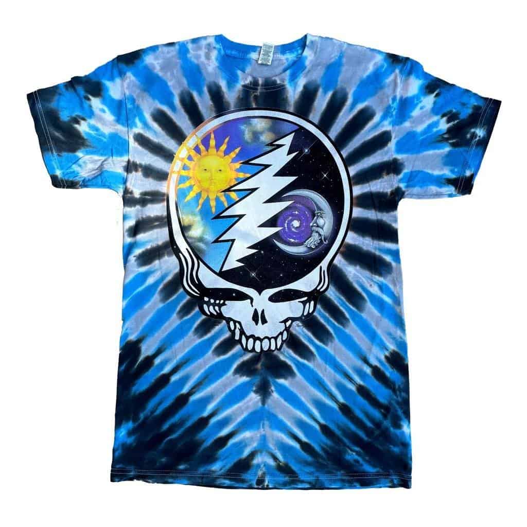 Vibrant blue tie-dye t-shirt featuring a Grateful Dead-inspired skull with sun, moon, and lightning bolt design, perfect for music festival or casual wear.
