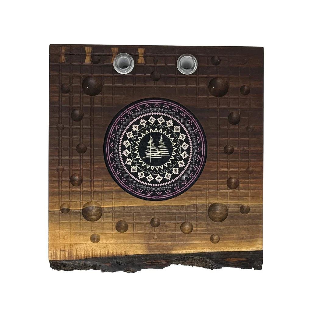Handcrafted wooden wall art with circular Indigenous-inspired design, featuring geometric patterns and natural wood texture for boho decor.