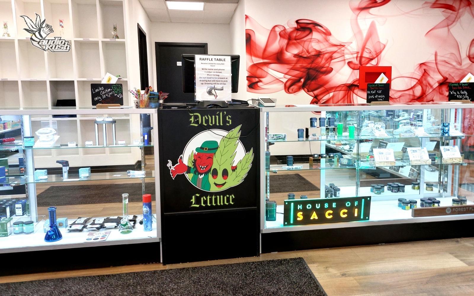 Storefront of Devil's Lettuce dispensary in West Seneca New York featuring a display of House of Sacci cannabis products