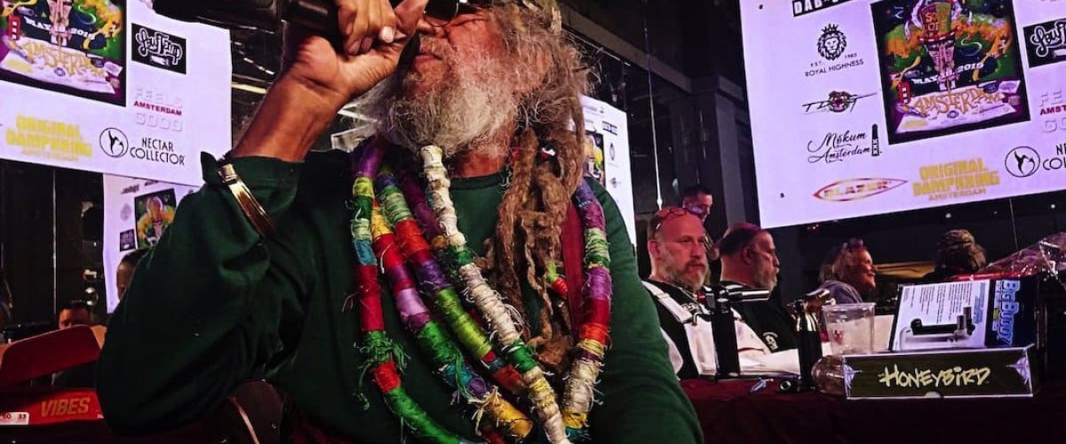 Soma of Soma's Sacred Seeds accepting his pendant for a second place win!